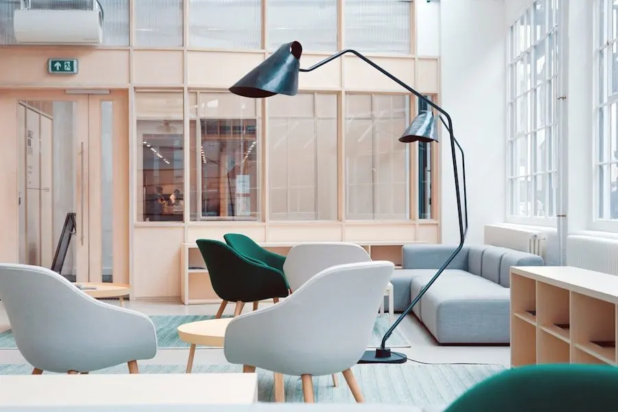 A bright open-plan living room with seating and natural light
